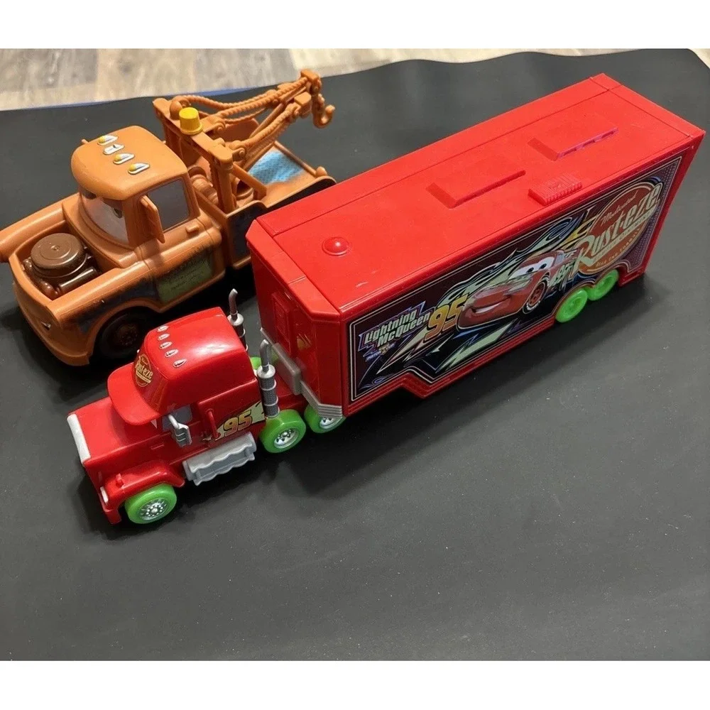 Disney Pixar Cars Lot - Mack Transforming Playset Hauler & Moving Moments Mater